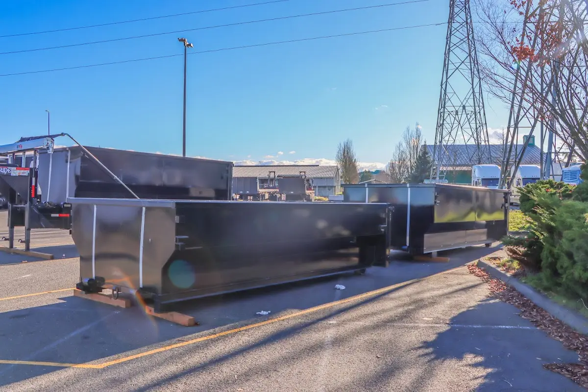 Roll-off dumpster ready for waste disposal at job site for 12 Yard Dumpster Rental in Chalco